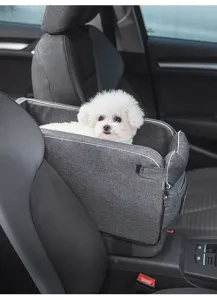 Details of the grey pet car seat installed in the center console for dogs and cats safely.