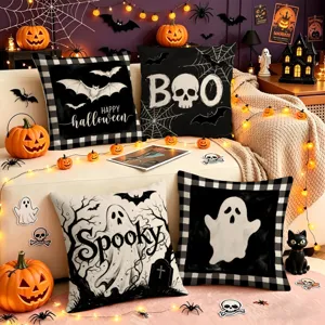 Halloween black and white decorative pillow covers set featuring ghost skull and bat patterns.