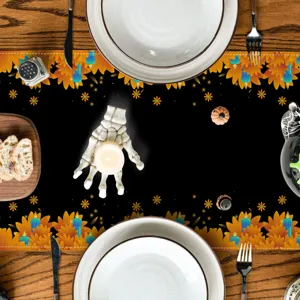 Halloween table runner set with spooky autumn leaves and skull candle decor for party