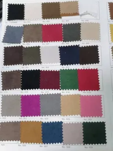 Fabric color swatch card sample with multiple color options for pet car seat customization.