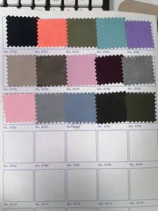 Fabric color swatch sample card detail showing various color options for custom pet car seats.