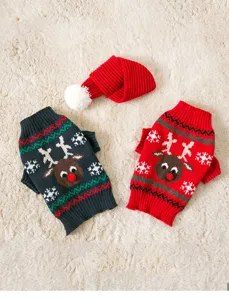 Close-up of Christmas pet sweater and scarf set featuring cute reindeer and snowflake motifs.