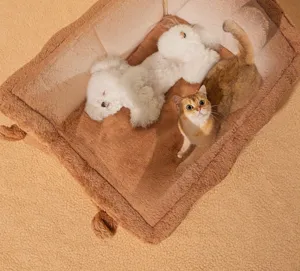 Cozy brown plush pet bed for cats and small dogs, warm and comfortable winter sleeping nest.