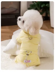 Details of warm yellow dog down jacket for small pets, featuring four-leg design and fleece lining.