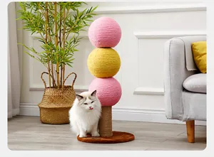 Cat scratching post with colorful sisal balls and sturdy base for indoor cats play and claw care.