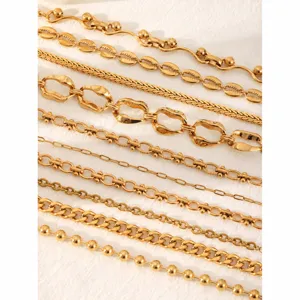Detailed closeup of luxurious 18k gold plated stainless steel fashion chain collection.