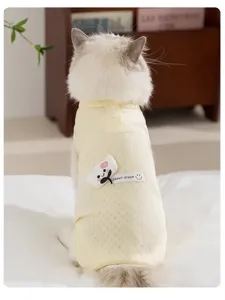 Cute cat recovery suit detail view, breathable yellow pet belly protection clothes for summer.