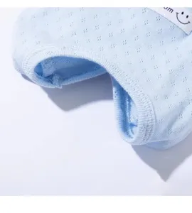 Light blue pet surgery recovery suit detail, breathable mesh fabric, comfortable pet clothing close-up.