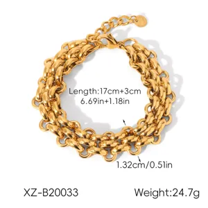 Gold titanium steel chunky cubic chain bracelet for women, stylish minimalist layered jewelry.