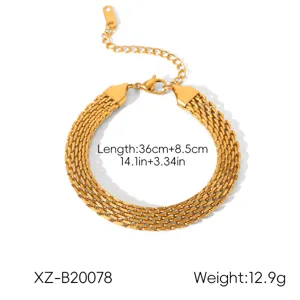Detailed view of multi-strand stainless steel gold bracelet with extension chain and lobster clasp.
