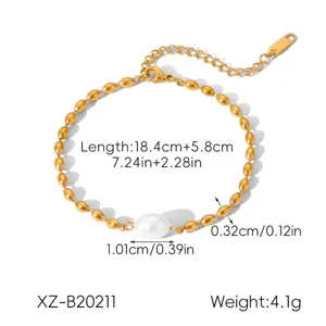 Gold stainless steel beaded bracelet detail featuring white pearl and clear measurement guide.