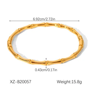 Minimalist stainless steel bamboo bangle, elegant gold finish, durable and stylish.