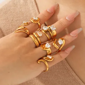Gold plated stainless steel cubic zirconia rings set, elegant minimalist finger jewelry for women.