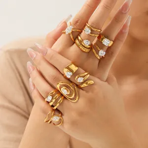 Exquisite gold-plated stainless steel stackable ring set with sparkling cubic zirconia details.
