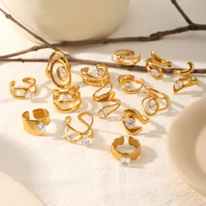 Detailed shot of multi-style 18k gold plated stainless steel geometric rings with shiny cubic zirconia.
