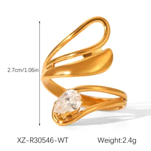 Detailed view of the 18k gold plated stainless steel open ring with a pear zircon stone.