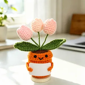 Handmade crochet tulip potted plant detail view, cute knitted flower desktop decor for gift.