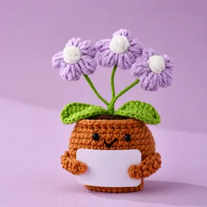 Handmade crochet potted plant doll with cute flower and sign, perfect desktop decor gift.
