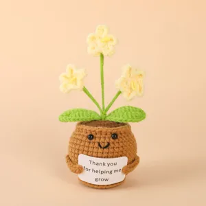Crochet potted plant detail showing cute face design and heartfelt thank you message card.