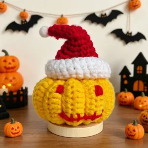 Handmade crochet Halloween pumpkin doll with Christmas hat, perfect desktop and car ornament.