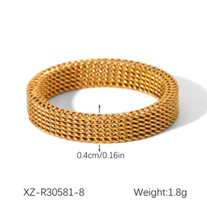 Detailed view of gold plated mesh stainless steel ring, stylish minimalist band jewelry for you.