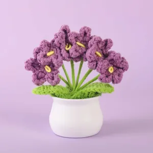 Handcrafted crochet purple flower potted plant, desktop ornament and lovely gift.