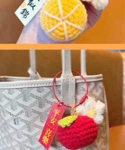 Handgemachte gehäkelte Fruchthandtuchtasche Schlüsselanhänger süß Strick Apfel Taschendeko
