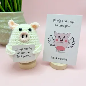 Handcrafted crochet flying pig doll with positive quote card, cute desktop ornament gift toy.