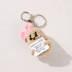 Handmade crochet potato keychain with positive energy card, cute knitted plush bag charm.