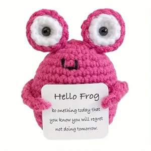 Handmade crochet pink frog doll ornament, cute wool stuffed animal toy for desk or car decor.