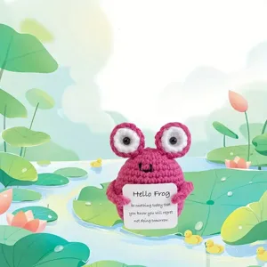 Handmade crochet pink frog doll ornament, cute desktop and car decor for gift giving.
