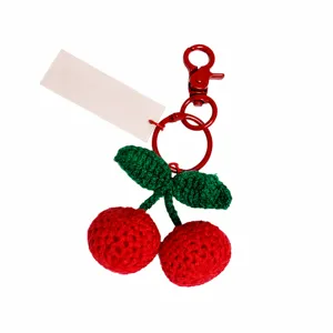 Handmade crochet cherry keychain with metal clasp, cute knitted fruit bag charm and accessory for keys.