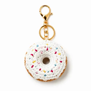 Handgemachter Häkel Donut Schlüsselanhänger Detail, süßer Plüsch Taschenanhänger Gold.