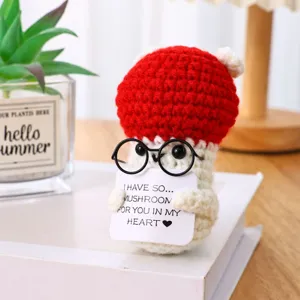 Handmade crochet mushroom doll with glasses and card, cute desktop and car interior decor item.