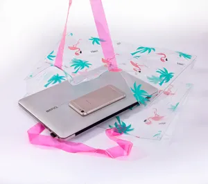 Sac de plage transparent en PVC avec anses roses et motif flamant rose pour vos voyages d'été.