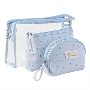 Clear waterproof cosmetic bag three-piece set with cute blue anchor pattern for travel.