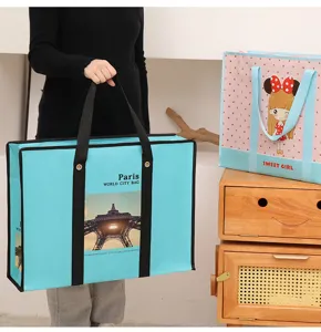 Large laminated non-woven storage bag with cartoon print, durable portable luggage organizer.