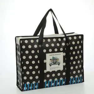 Gran bolsa de almacenamiento impermeable de tela no tejida con estampado de lunares y asas.