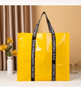 Bolsa de compras tejida laminada amarilla, bolso portátil duradero para viajes y regalos.
