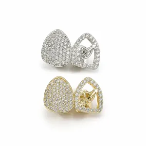 Hip hop gold and silver tone zirconia hollow heart arrow teeth grills jewelry accessory set.