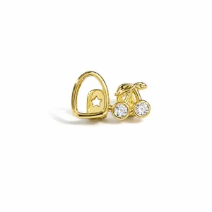 Gold hip hop grillz tooth cap with crystal cherry design, trendy fashion dental jewelry for party.