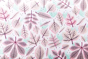 Cosmetic bag PU leather fabric detail featuring beautiful leaf print pattern for stylish travel.