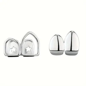 Close-up detail of silver hip hop teeth grillz with hollow star and smooth designs.