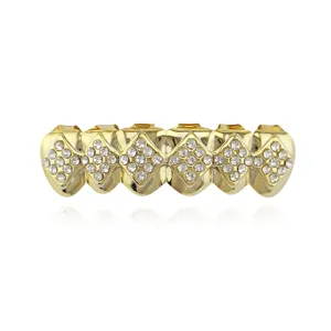 Gold hip hop grillz for teeth with sparkling zircon stones, perfect hiphop fashion party jewelry.