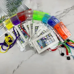 Colorful waterproof phone pouch with neck lanyard, transparent touch screen dry bag for travel.