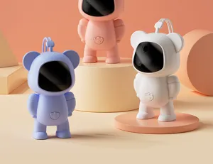 Close-up detail of cute portable cartoon bear hand warmer with digital display and lanyard.
