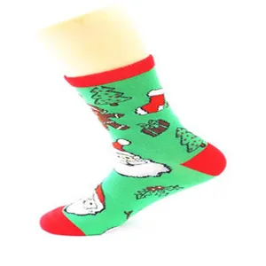 Christmas mid-calf socks with cute Santa and tree print, cozy cotton blend holiday footwear.