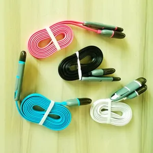 Detailed view of colorful flat charging cables in pink, black, blue, and white variants.