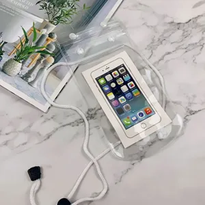 Clear waterproof phone pouch detail shot, touch-screen friendly design for underwater use.