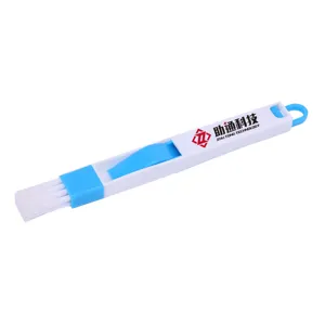 Detailed view of the window groove cleaning brush with dense bristles for keyboard and door seams.